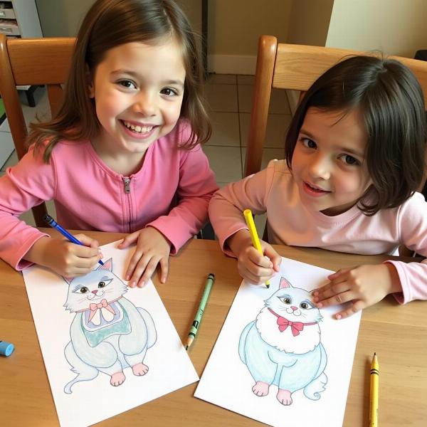 Niños coloreando dibujos de gatos